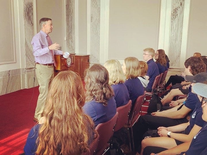 students listening to a speaker