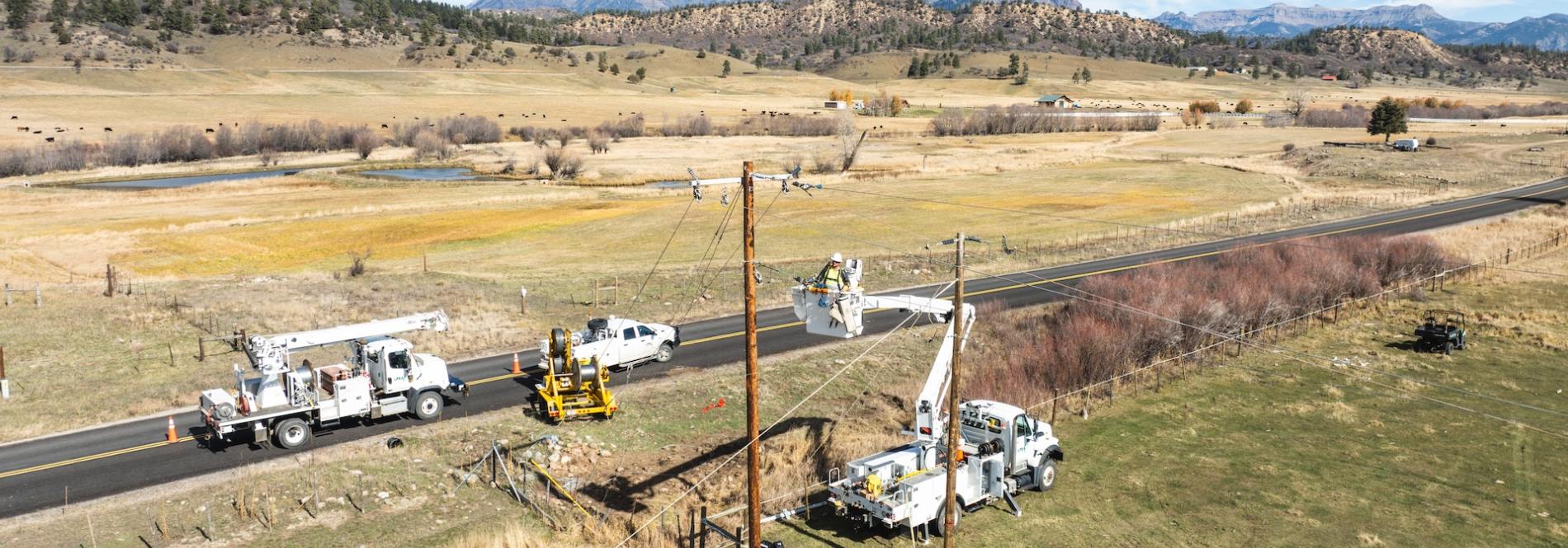 bucket trucks working on power lines in Pagosa Springs